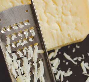 cheese being grated