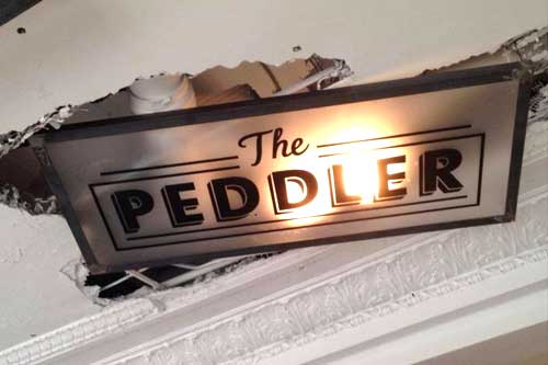 The Peddler sign